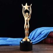 Little gold Man metal trophy