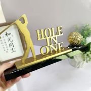 Gold golf trophy