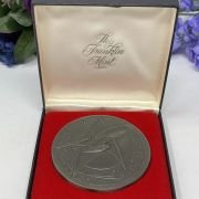 pewter medallion